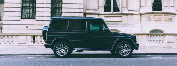 black-mercedes-g-wagen-parked-up