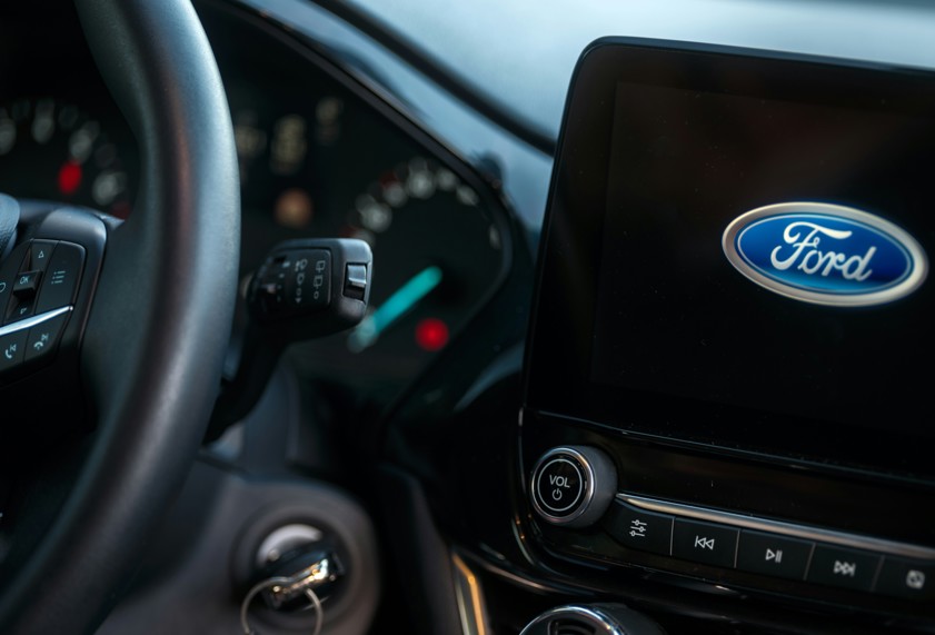 a close up of a steering wheel of a car