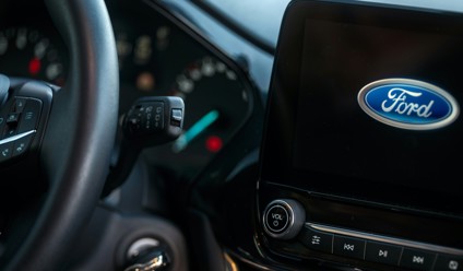 a close up of a steering wheel of a car
