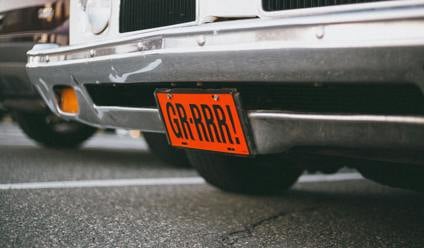 close up photo of a vehicle license plate