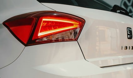 a white car parked in a parking lot