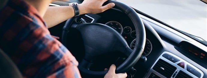 person driving a car