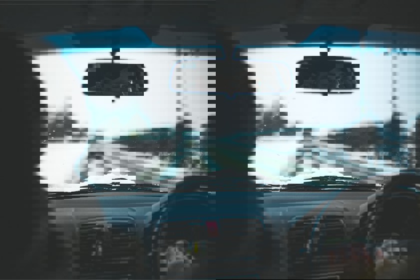 man driving in snowy conditions