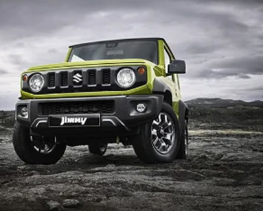suzuki jimny commercial on rugged road