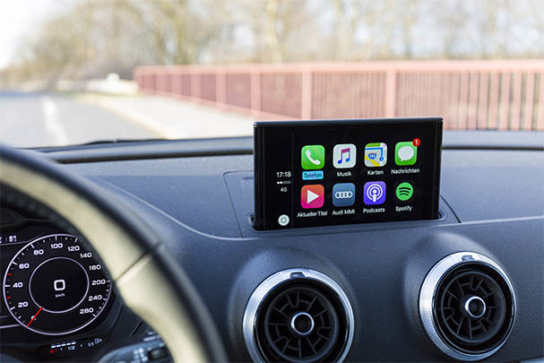 Close up of a car's dashboard with touchscreen.