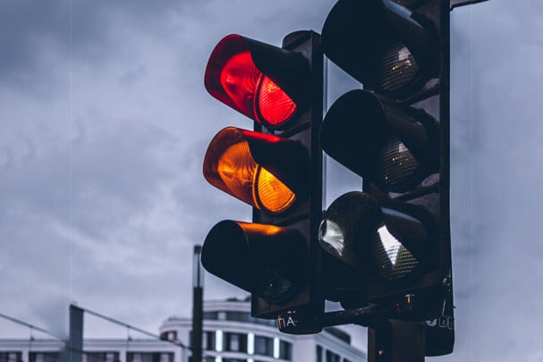 traffic light with amber and red light on 