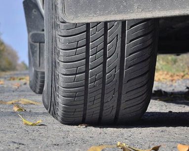 Car tyre on a road