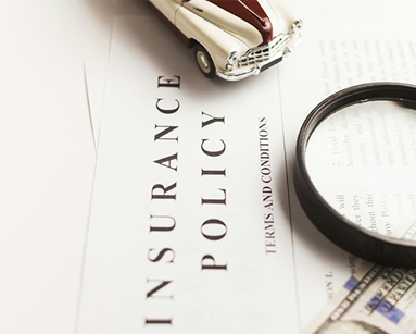 A magnifying glass sitting on a piece of paper