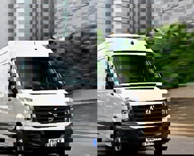 vw van driving on road