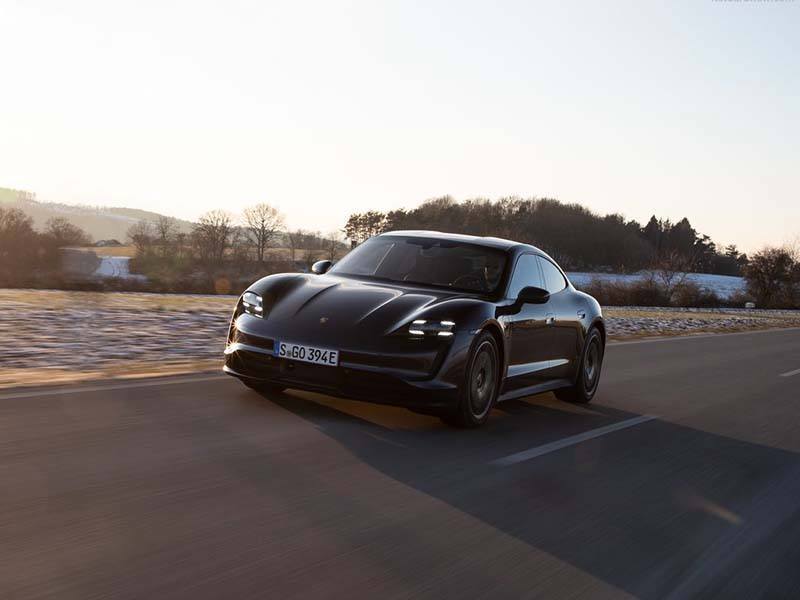 Porsche Taycan Saloon driving on road