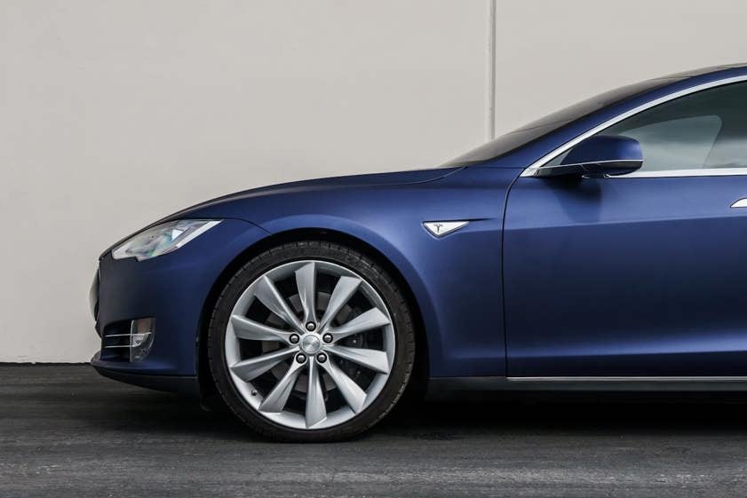 Side on view of a Tesla car