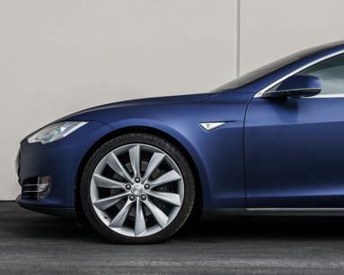 Side on view of a Tesla car