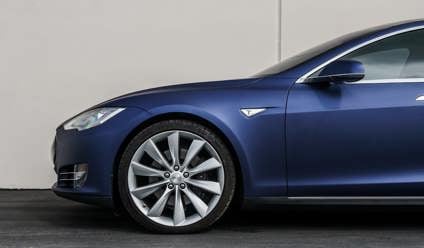 Side on view of a Tesla car