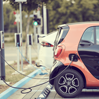 orange smart ev charging at public charger