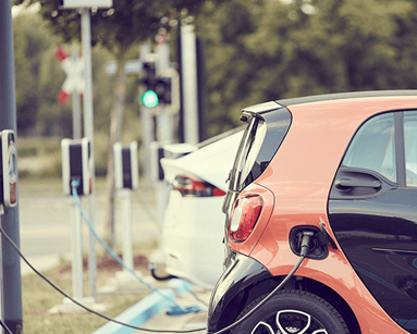orange smart ev charging at public charger