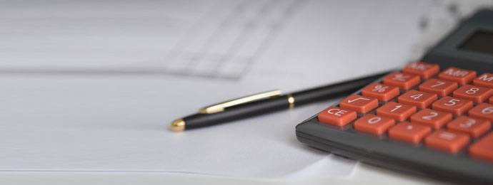 pen and red calculator