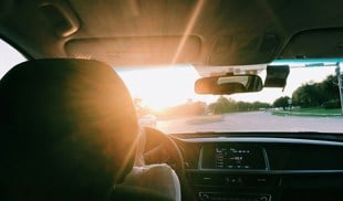 person driving through daytime