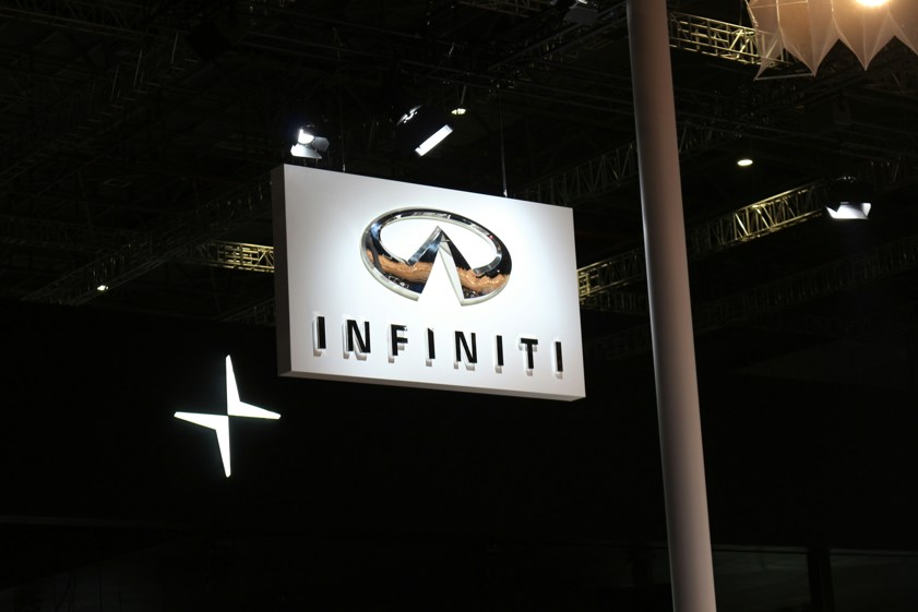 a sign hanging from the ceiling of a building