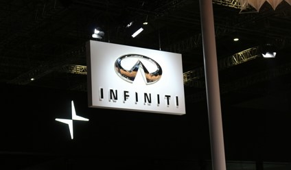 a sign hanging from the ceiling of a building