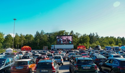 a large group of cars in a parking lot
