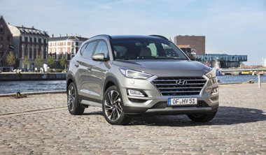 The front exterior view of the new grey Hyundai Tucson