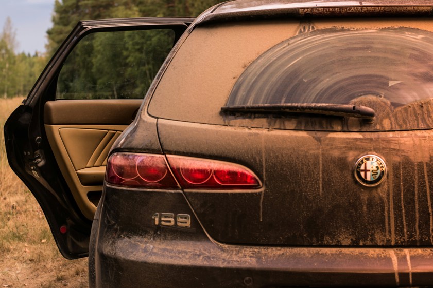 rear view photo of black alfa romeo