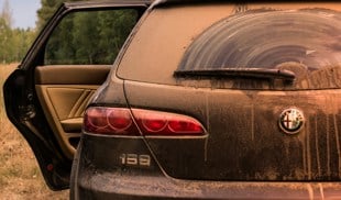rear view photo of black alfa romeo