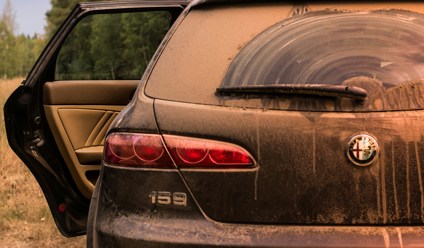 rear view photo of black alfa romeo