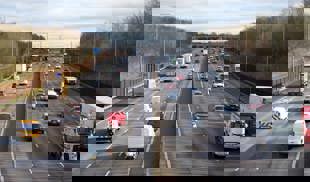 Aerial view of cars driving on a motorway