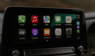 Close-up of a Hyundai car infotainment screen featuring Apple CarPlay interface
