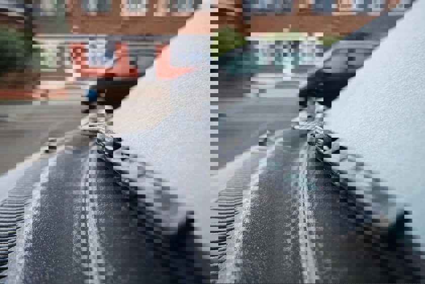 black car with ice on windscreen