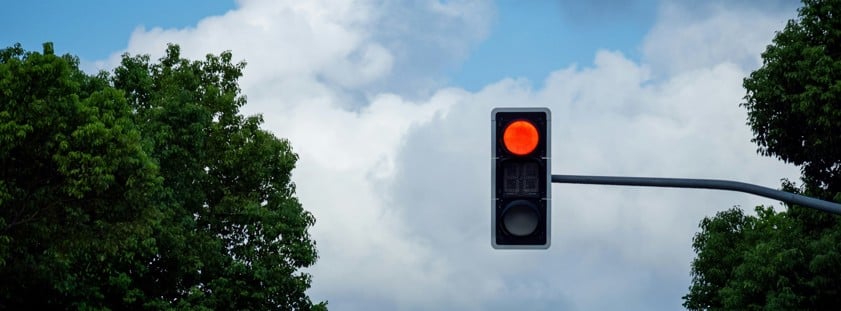 a traffic light that is on a pole