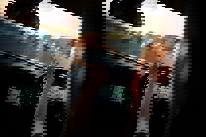 woman driving on the road