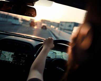 woman driving on the road