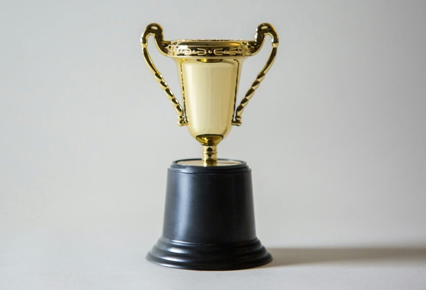 yellow and white trophy