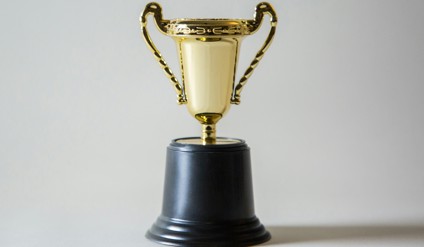yellow and white trophy