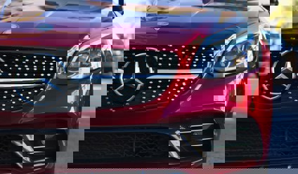 red mercedes-benz car
