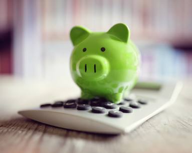 piggy bank on calculator