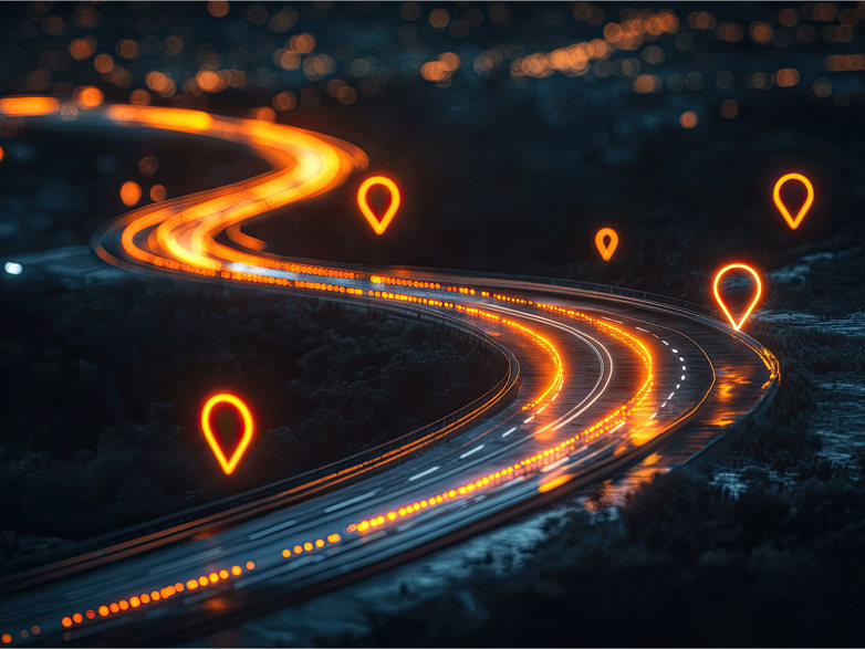 Animated graphic of a road with location pins dotted around