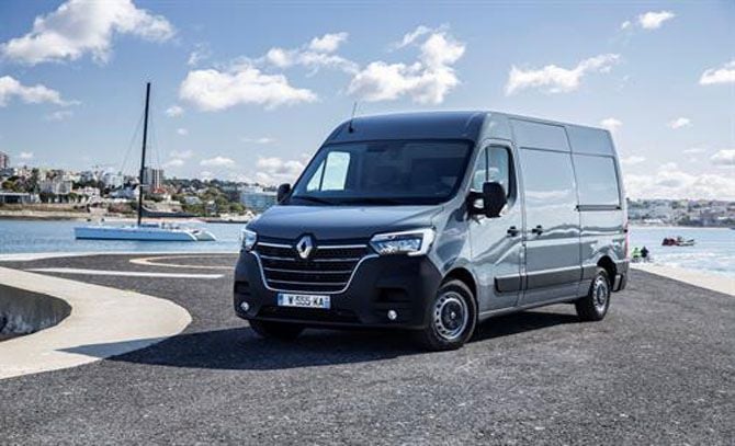 A photo of a Renault Master van parked on a road, with the Renault logo visible.