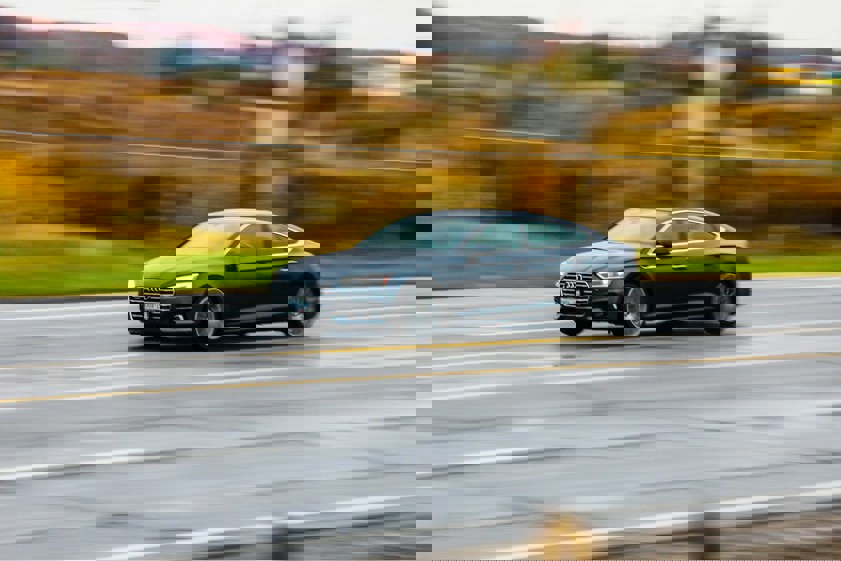 Black Audi driving on a motorway