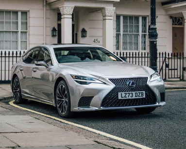 Lexus LS lease car in silver parked on street