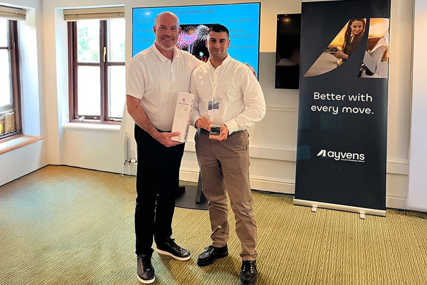 Charles Campbell collecting Platinum-Premier Broker awar