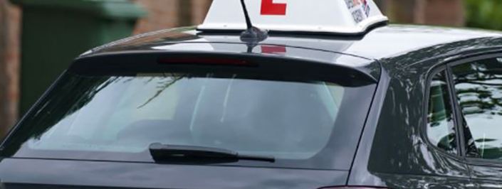 close up of learner driver sign on car