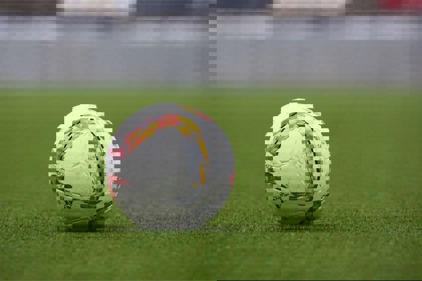 white and gray adidas soccerball on lawn grass
