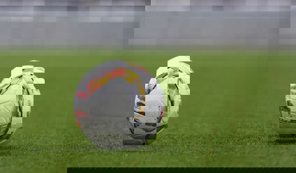 white and gray adidas soccerball on lawn grass