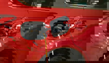 red electric car charging