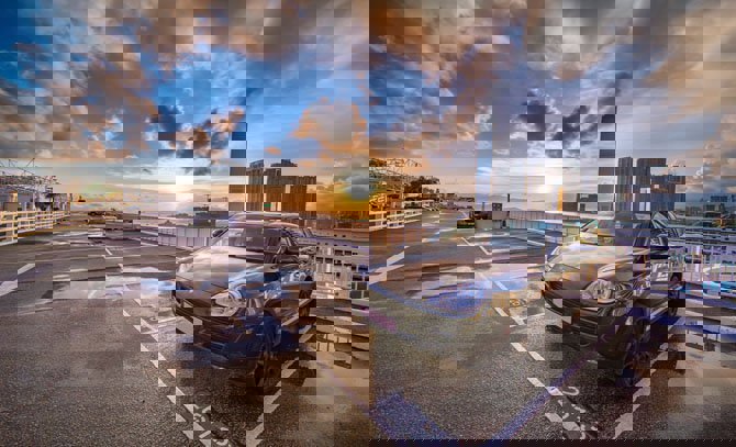 Image of a car parked in a parking space.