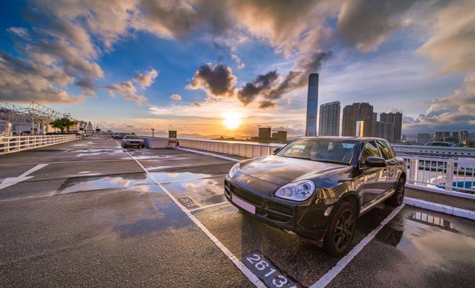 Image of a car parked in a parking space. 