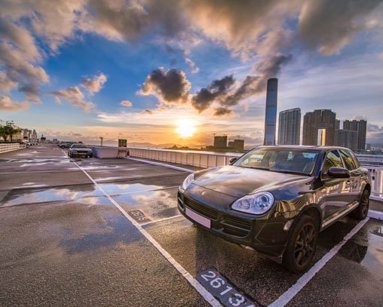 Image of a car parked in a parking space. 